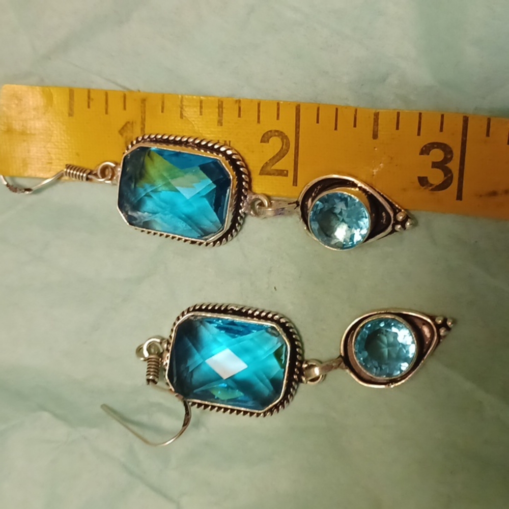 Blue topaz? 925 earrings.